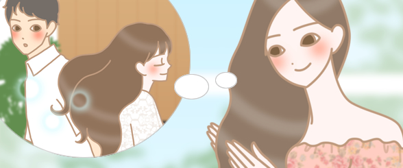 髪のお手入れをする女性