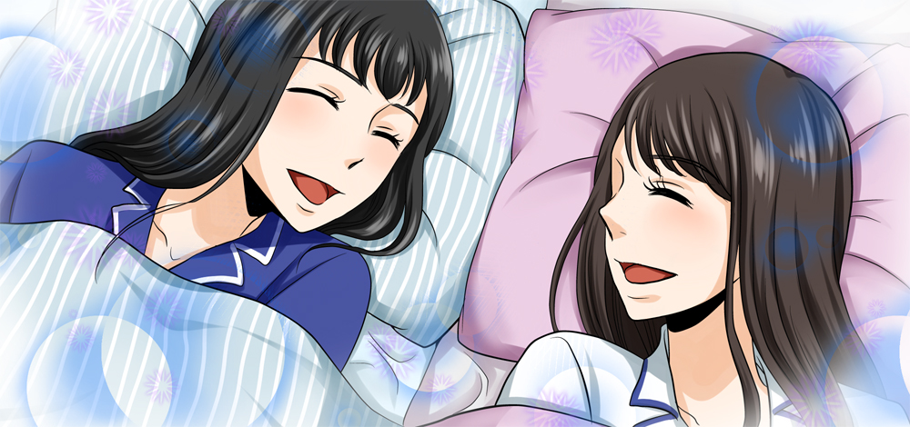 楽しそうに布団で話す女性たち