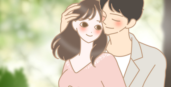抱きしめるカップル