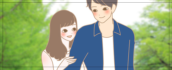腕を組んでデートする男女